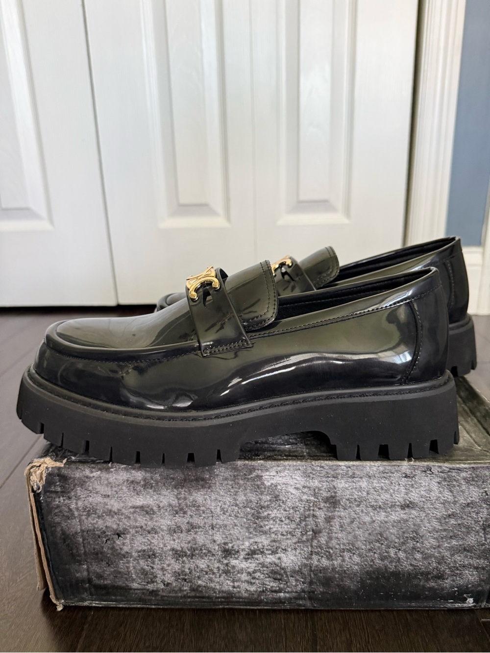Black Patent Lug Sole Slip-On Loafers with Gold Hardware